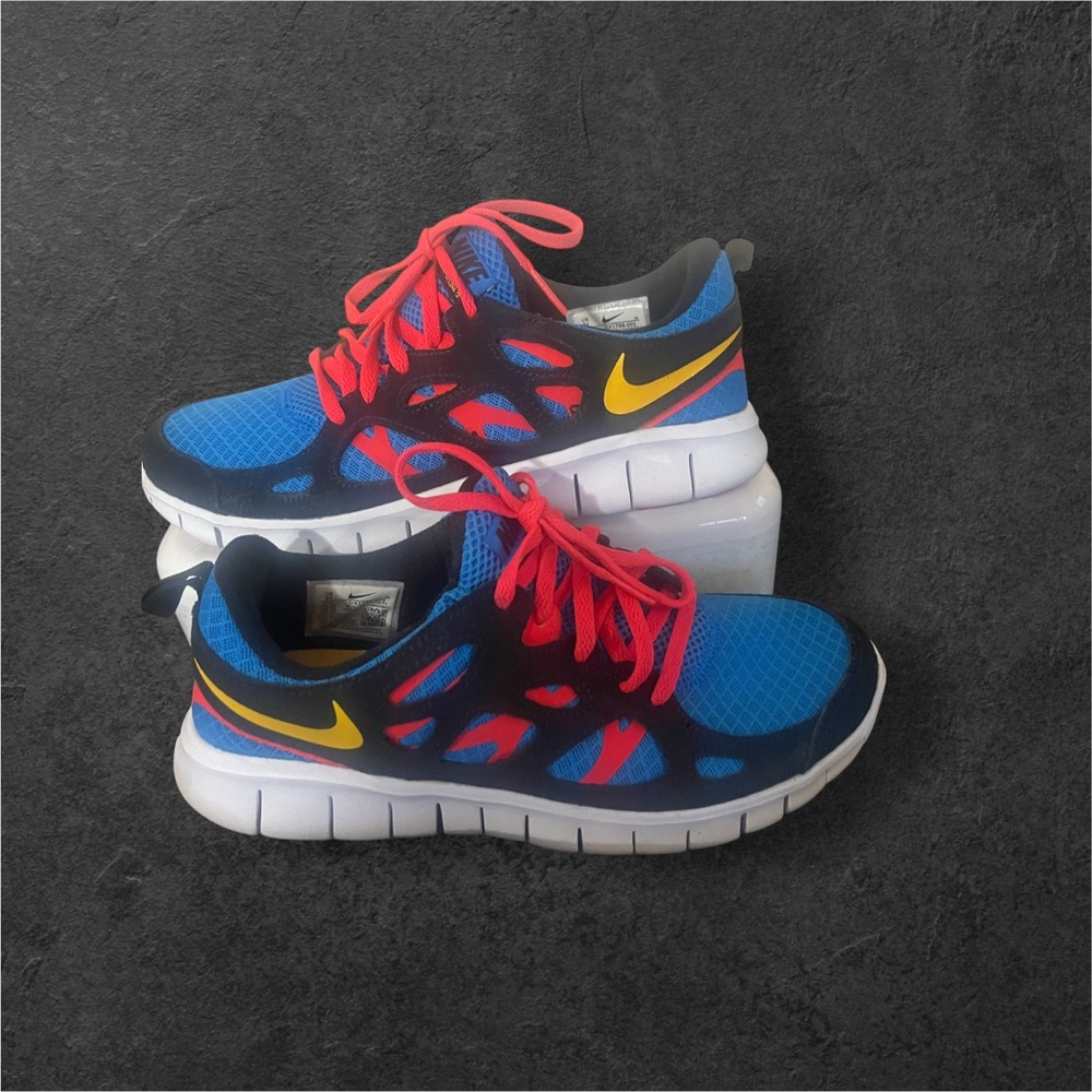 Nike Blue and Red Sneakers with Flexible Design